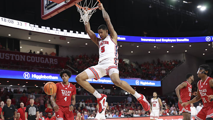 Jan 6, 2026; Houston, Texas, USA; Houston Cougars center Chris Cenac Jr. (5) dunks the ball during the second half against the Texas Tech Red Raiders at Fertitta Center. Mandatory Credit: Troy Taormina-Imagn Images