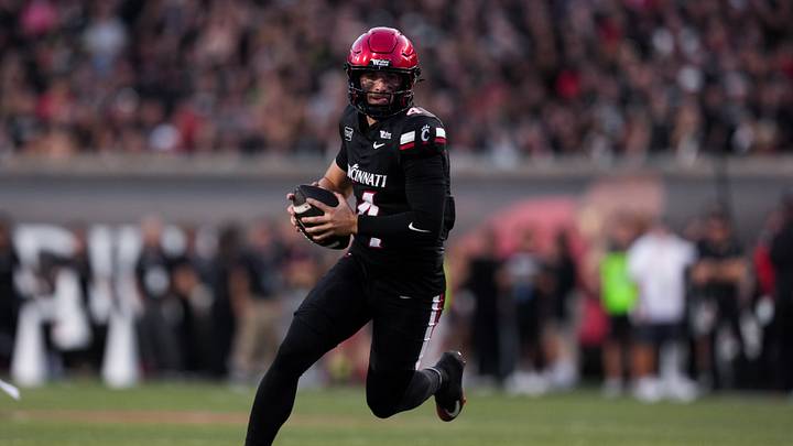 Sep 12, 2026; Cincinnati, Ohio, USA; Cincinnati Bearcats quarterback JC French IV (4) runs with the ball against the Western Carolina Catamounts in the first half at Nippert Stadium. Mandatory Credit: Aaron Doster-Imagn Images Sep 12, 2026; Cincinnati, Ohio, USA; Cincinnati Bearcats quarterback JC French IV (4) runs with the ball against the Western Carolina Catamounts in the first half at Nippert Stadium. Mandatory Credit: Aaron Doster-Imagn Images