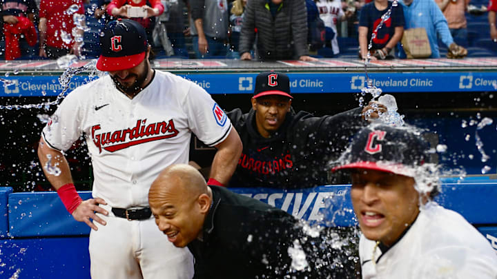 Cleveland Guardians pitcher Triston McKenzie (24) throws water on catcher Austin Hedges, left, TV personality Andre Knott, middle and designated hitter Bo Naylor, right, after the Guardians beat the Los Angeles Angels at Progressive Field on May 4, 2024. Cleveland Guardians pitcher Triston McKenzie (24) throws water on catcher Austin Hedges, left, TV personality Andre Knott, middle and designated hitter Bo Naylor, right, after the Guardians beat the Los Angeles Angels at Progressive Field on May 4, 2024.