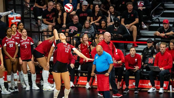 Oct 10, 2026; Lincoln, Nebraska, USA;  Wisconsin Badgers middle blocker Natalie Wardlow (12) serves against the Nebraska Cornhuskers during the first set at Bob Devaney Sport Center.  Mandatory Credit: Dylan Widger-Imagn Images