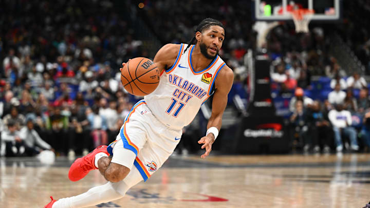 Mar 21, 2026; Washington, District of Columbia, USA; Oklahoma City Thunder guard Isaiah Joe (11) advances the ball against the Washington Wizards during the second half at Capital One Arena. Mandatory Credit: Brad Mills-Imagn Images Mar 21, 2026; Washington, District of Columbia, USA; Oklahoma City Thunder guard Isaiah Joe (11) advances the ball against the Washington Wizards during the second half at Capital One Arena. Mandatory Credit: Brad Mills-Imagn Images