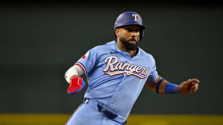 Jun 7, 2026; Arlington, Texas, USA; Texas Rangers shortstop Ezequiel Duran (20) runs to third base during the game against the Cleveland Guardians at Globe Life Field. Mandatory Credit: Jerome Miron-Imagn Images