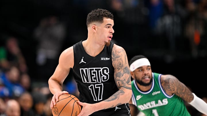 Jan 12, 2026; Dallas, Texas, USA; Brooklyn Nets forward Michael Porter Jr. (17) controls the ball in front of Dallas Mavericks guard Jaden Hardy (1) during the first quarter at the American Airlines Center. Mandatory Credit: Jerome Miron-Imagn Images
