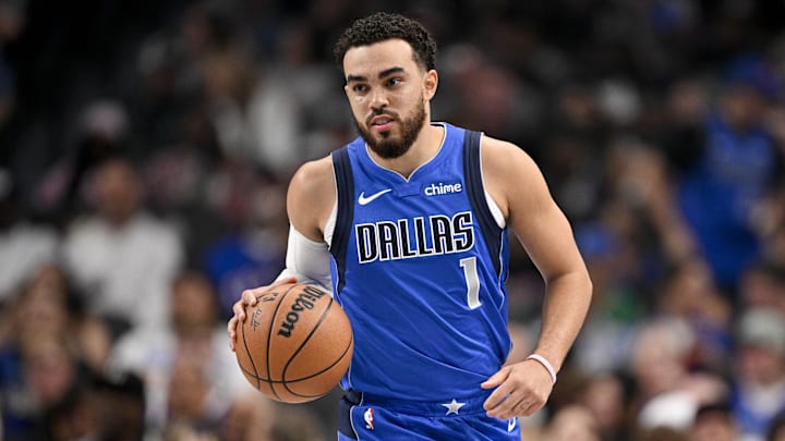 Feb 26, 2026; Dallas, Texas, USA; Dallas Mavericks guard Tyus Jones (1) brings the ball up court against the Sacramento Kings during the second quarter at the American Airlines Center. Mandatory Credit: Jerome Miron-Imagn Images
