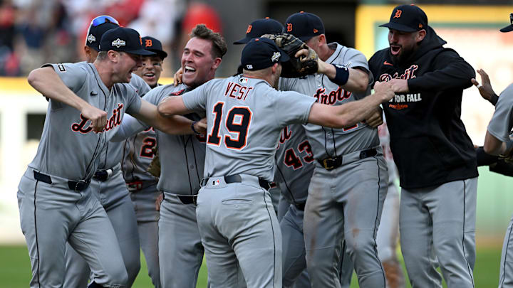 Detroit Tigers players celebrate after winning the Wild Card round against the Cleveland Guardians.