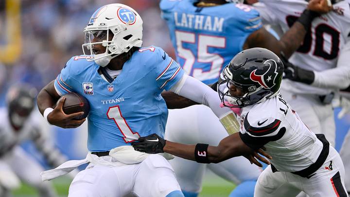 Oct 11, 2026; Nashville, Tennessee, USA; Houston Texans cornerback Kamari Lassiter (3) chases down Tennessee Titans quarterback Cam Ward (1) during the first half at Nissan Stadium. Mandatory Credit: Steve Roberts-Imagn Images Oct 11, 2026; Nashville, Tennessee, USA; Houston Texans cornerback Kamari Lassiter (3) chases down Tennessee Titans quarterback Cam Ward (1) during the first half at Nissan Stadium. Mandatory Credit: Steve Roberts-Imagn Images