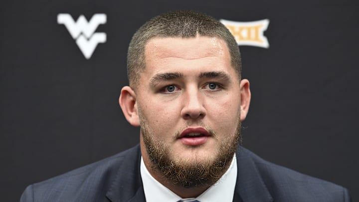Jul 10, 2024; Las Vegas, NV, USA; West Virginia Mountaineers offensive lineman Wyatt Milum speaks to the media during the Big 12 Media Days at Allegiant Stadium. Mandatory Credit: Candice Ward-Imagn Images