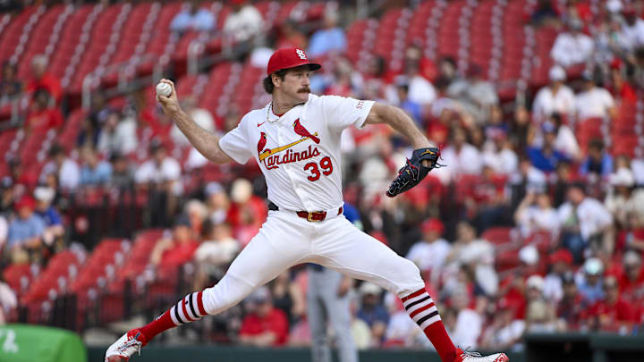 Jun 10, 2025; St. Louis, Missouri, USA;  St. Louis Cardinals starting pitcher Miles Mikolas (39) pitches against the Toronto Blue Jays during the first inning at Busch Stadium. Mandatory Credit: Jeff Curry-Imagn Images