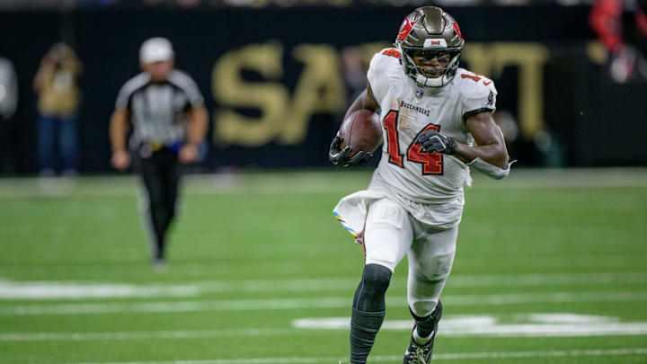 Oct 13, 2024; New Orleans, Louisiana, USA; Tampa Bay Buccaneers wide receiver Chris Godwin (14) runs in for a touchdown during the third quarter against the New Orleans Saints at Caesars Superdome. Mandatory Credit: Matthew Hinton-Imagn Images
