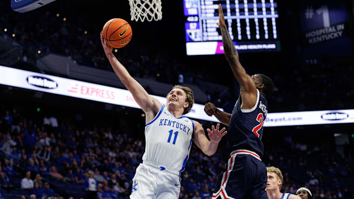 Nov 22, 2024; Lexington, Kentucky, USA; Kentucky Wildcats guard Travis Perry (11) goes to the basket during the second half against the Jackson State Tigers at Rupp Arena at Central Bank Center. Mandatory Credit: Jordan Prather-Imagn Images
