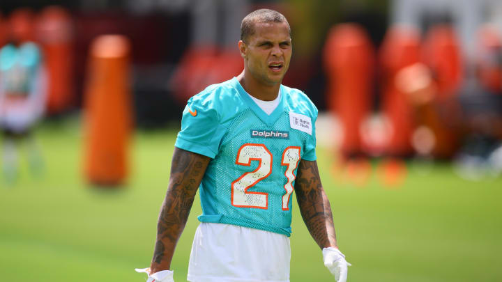 Jun 4, 2024; Miami Gardens, FL, USA; Miami Dolphins safety Jordan Poyer (21) works out during mandatory minicamp at Baptist Health Training Complex. Jun 4, 2024; Miami Gardens, FL, USA; Miami Dolphins safety Jordan Poyer (21) works out during mandatory minicamp at Baptist Health Training Complex.