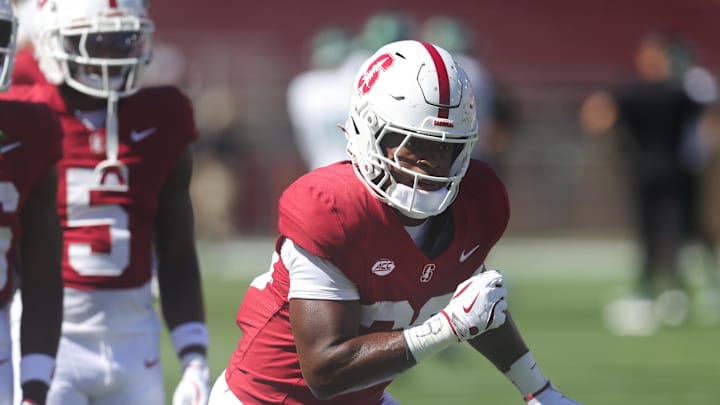 Sep 7, 2024; Stanford, California, USA; Stanford Cardinal running back Micah Ford (20) warms up before a game against the Cal Poly Mustangs at Stanford Stadium. Mandatory Credit: Sergio Estrada-Imagn Images Sep 7, 2024; Stanford, California, USA; Stanford Cardinal running back Micah Ford (20) warms up before a game against the Cal Poly Mustangs at Stanford Stadium. Mandatory Credit: Sergio Estrada-Imagn Images