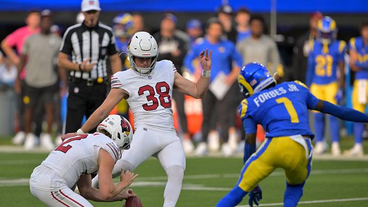 Oct 18, 2026; Inglewood, California, USA; Arizona Cardinals kicker Chad Ryland (38) kicks the game winning field goal on a hold from punter Blake Gillikin (12) as Los Angeles Rams cornerback Emmanuel Forbes Jr. (1) defends in the fourth quarter at SoFi Stadium. Mandatory Credit: Jayne Kamin-Oncea-Imagn Images Oct 18, 2026; Inglewood, California, USA; Arizona Cardinals kicker Chad Ryland (38) kicks the game winning field goal on a hold from punter Blake Gillikin (12) as Los Angeles Rams cornerback Emmanuel Forbes Jr. (1) defends in the fourth quarter at SoFi Stadium. Mandatory Credit: Jayne Kamin-Oncea-Imagn Images