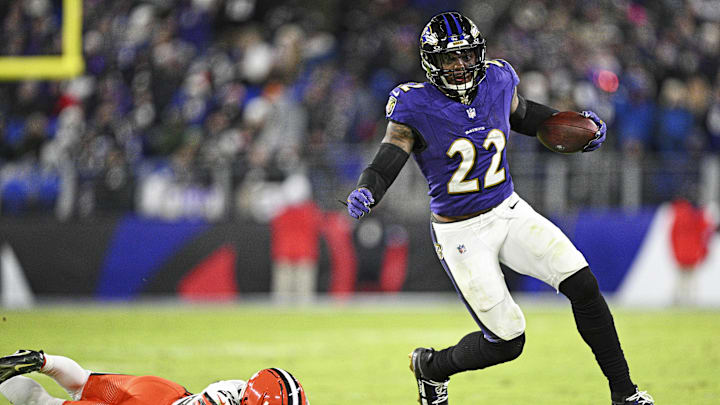 Jan 4, 2025; Baltimore, Maryland, USA; Baltimore Ravens running back Derrick Henry (22) runs for a touchdown as Cleveland Browns cornerback Cameron Mitchell (29) defends during the fourth quarter at M&T Bank Stadium. Mandatory Credit: Tommy Gilligan-Imagn Images