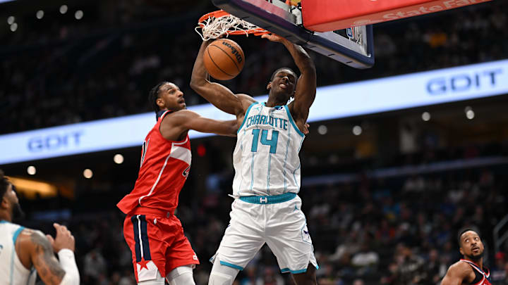 Oct 26, 2025; Washington, District of Columbia, USA; Charlotte Hornets forward Moussa Diabate (14) dunks the ball in front to Washington Wizards center Alex Sarr (20) during the third quarter at Capital One Arena. Mandatory Credit: Rafael Suanes-Imagn Images Oct 26, 2025; Washington, District of Columbia, USA; Charlotte Hornets forward Moussa Diabate (14) dunks the ball in front to Washington Wizards center Alex Sarr (20) during the third quarter at Capital One Arena. Mandatory Credit: Rafael Suanes-Imagn Images
