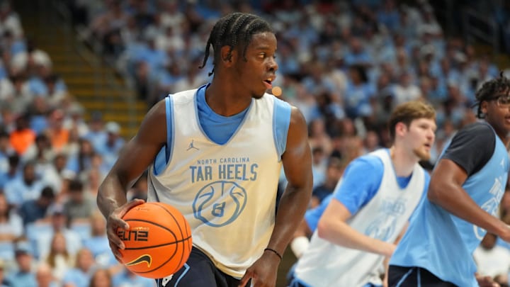Oct 4, 2025; Charlotte, NC, USA; North Carolina Tar Heels forward Caleb Wilson (8) with the ball in the second half at Dean E. Smith Center. 
