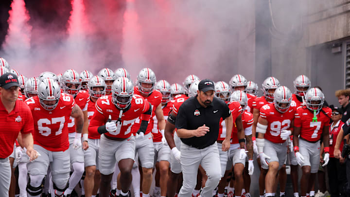 Sep 6, 2025; Columbus, Ohio, USA;  Ohio State Buckeyes head coach Ryan Day enters the field before the game against the Grambling State Tigers at Ohio Stadium. Mandatory Credit: Joseph Maiorana-Imagn Images