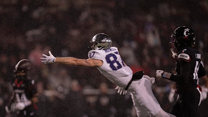 Cincinnati Bearcats defensive back Jordan Robinson (16) guards TCU Horned Frogs wide receiver Blake Nowell (87) as he drops a pass in the third quarter of the NCAA football game between Cincinnati Bearcats and TCU Horned Frogs at Nippert Stadium in Cincinnati on Saturday, Nov. 30, 2024.