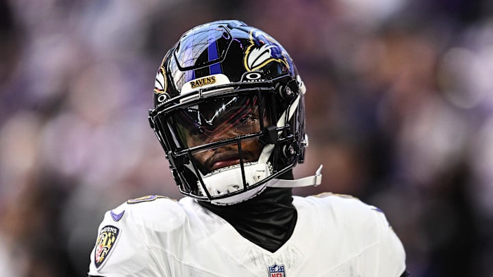 Nov 9, 2025; Minneapolis, Minnesota, USA; Baltimore Ravens quarterback Lamar Jackson (8) looks on before the game against the Minnesota Vikings at U.S. Bank Stadium. Mandatory Credit: Jeffrey Becker-Imagn Images