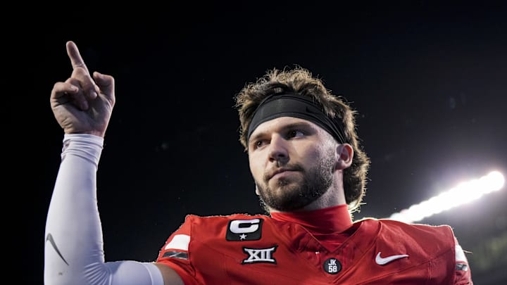 Cincinnati, Ohio, USA; Cincinnati Bearcats quarterback Brendan Sorsby points to fans as he walks off the field after defeating the Baylor Bears at Nippert Stadium. Cincinnati, Ohio, USA; Cincinnati Bearcats quarterback Brendan Sorsby points to fans as he walks off the field after defeating the Baylor Bears at Nippert Stadium.