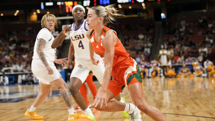 Mar 26, 2023; Greenville, SC, USA;  Miami Hurricanes guard Hanna Cavinder (15) drives to the basket against the LSU Lady Tigers during the second half of the NCAA Women's Tournament at Bon Secours Wellness Arena. 