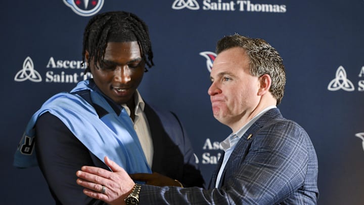 Tennessee Titans first round pick Cameron Ward shakes hands with the Tennessee Titans general manager Mike Borgonzi. Mandatory Credit: Steve Roberts-Imagn Images