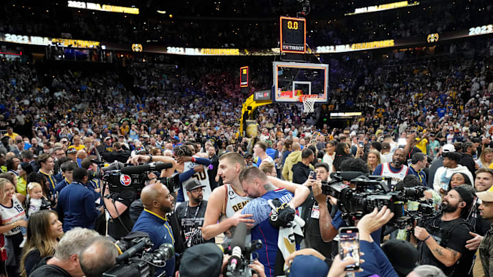 Jun 12, 2023; Denver, Colorado, USA; Denver Nuggets center Nikola Jokic (15) celebrates with his family after winning the 2023 NBA Finals against the Miami Heat at Ball Arena. Mandatory Credit: Kyle Terada-Imagn Images Jun 12, 2023; Denver, Colorado, USA; Denver Nuggets center Nikola Jokic (15) celebrates with his family after winning the 2023 NBA Finals against the Miami Heat at Ball Arena. Mandatory Credit: Kyle Terada-Imagn Images