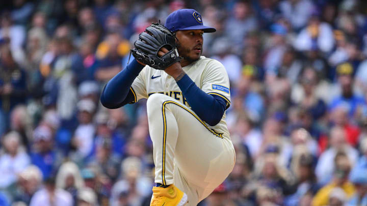 Sep 4, 2025; Milwaukee, Wisconsin, USA; Milwaukee Brewers starting pitcher Freddy Peralta (51) throws against the Philadelphia Phillies in the first inning at American Family Field. Mandatory Credit: Benny Sieu-Imagn Images