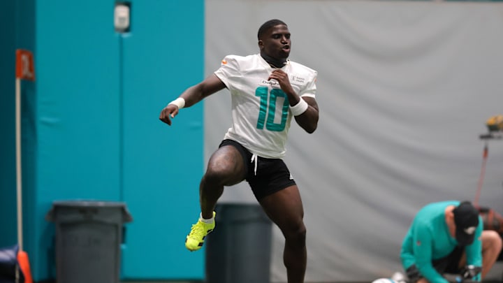 Miami Dolphins wide receiver Tyreek Hill (10) works out during training camp at Baptist Health Training Complex.