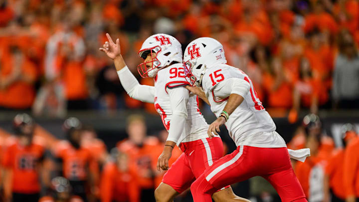 Sep 26, 2025; Corvallis, Oregon, USA; Houston Cougars place kicker Ethan Sanchez (92) celebrates his winning field goal kick in overtime with quarterback Jake Sock (15) against the Oregon State Beavers at Reser Stadium. Mandatory Credit: Craig Strobeck-Imagn Images Sep 26, 2025; Corvallis, Oregon, USA; Houston Cougars place kicker Ethan Sanchez (92) celebrates his winning field goal kick in overtime with quarterback Jake Sock (15) against the Oregon State Beavers at Reser Stadium. Mandatory Credit: Craig Strobeck-Imagn Images