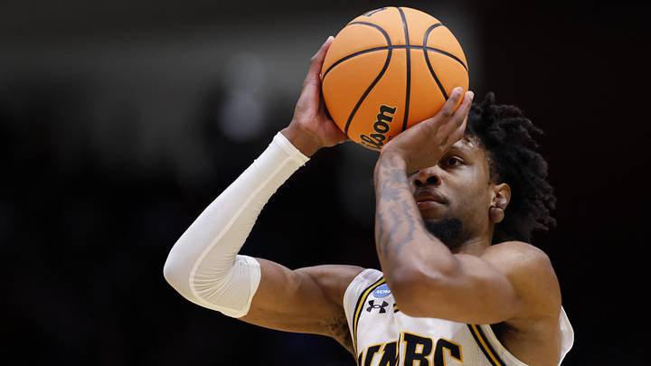 Mar 17, 2026; Dayton, OH, USA; UMBC Retrievers forward DJ Armstrong (3) shoots the ball in the first half against the Howard Bison during a first four game of the men's 2026 NCAA Tournament at University of Dayton Arena.