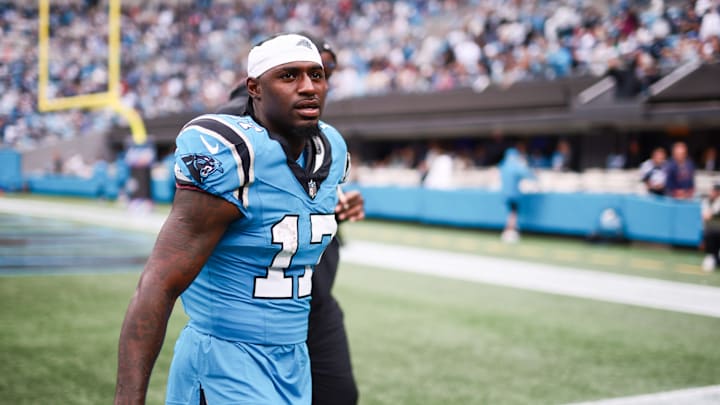 Oct 12, 2025; Charlotte, North Carolina, USA; Carolina Panthers wide receiver Xavier Legette (17) walks off the field during halftime against the Dallas Cowboys at Bank of America Stadium. Mandatory Credit: Scott Kinser-Imagn Images