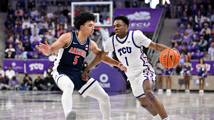 Jan 10, 2026; Fort Worth, Texas, USA; TCU Horned Frogs guard Jayden Pierre (1) brings the ball up court past Arizona Wildcats guard Brayden Burries (5) during the first half at the Ed and Rae Schollmaier Arena. Mandatory Credit: Jerome Miron-Imagn Images Jan 10, 2026; Fort Worth, Texas, USA; TCU Horned Frogs guard Jayden Pierre (1) brings the ball up court past Arizona Wildcats guard Brayden Burries (5) during the first half at the Ed and Rae Schollmaier Arena. Mandatory Credit: Jerome Miron-Imagn Images
