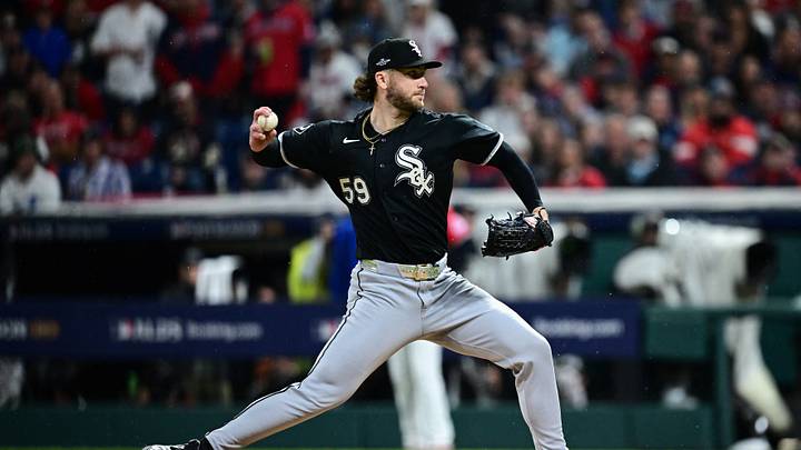 Oct 10, 2026; Cleveland, Ohio, USA;  Chicago White Sox pitcher Sean Burke (59) delivers a pitch during the second inning against the Cleveland Guardians in game five of the ALDS for the 2026 MLB Playoffs at Progressive Field.  Mandatory Credit: David Dermer-Imagn Images