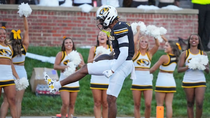 Sep 7, 2024; Columbia, Missouri, USA; Missouri Tigers wide receiver Theo Wease Jr. (1) celebrates after a run against the Buffalo Bulls during the first half at Faurot Field at Memorial Stadium. Mandatory Credit: Denny Medley-Imagn Images