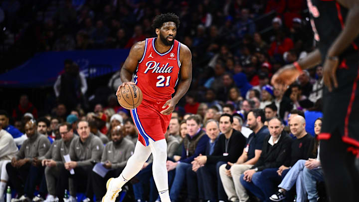 Dec 22, 2023; Philadelphia, Pennsylvania, USA; Philadelphia 76ers center Joel Embiid (21) controls the ball against the Toronto Raptors in the first quarter at Wells Fargo Center. Mandatory Credit: Kyle Ross-Imagn Images