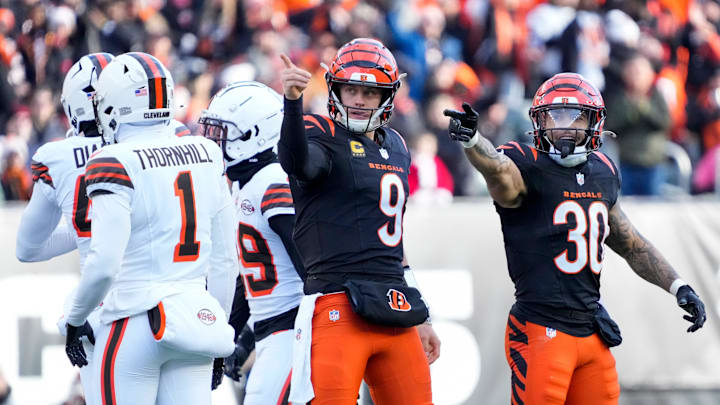 Cincinnati Bengals quarterback Joe Burrow (9) and running back Chase Brown (30) celebrate after a first down run by Burrow in the second quarter of the NFL Week 16 game between the Cincinnati Bengals and the Cleveland Browns at Paycor Stadium in downtown Cincinnati on Sunday, Dec. 22, 2024. The Bengals led 17-0 at halftime.