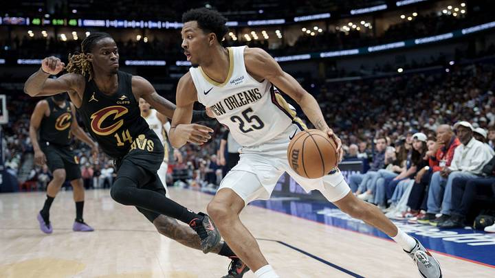 Mar 21, 2026; New Orleans, Louisiana, USA; New Orleans Pelicans forward Trey Murphy III (25) dribbles against Cleveland Cavaliers guard Keon Ellis (14) during the first half at Smoothie King Center. Mandatory Credit: Matthew Hinton-Imagn Images Mar 21, 2026; New Orleans, Louisiana, USA; New Orleans Pelicans forward Trey Murphy III (25) dribbles against Cleveland Cavaliers guard Keon Ellis (14) during the first half at Smoothie King Center. Mandatory Credit: Matthew Hinton-Imagn Images