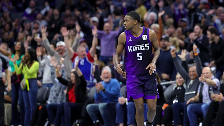 Nov 15, 2024; Sacramento, California, USA; Sacramento Kings guard De'Aaron Fox (5) reacts after scoring a basket during overtime against the Minnesota Timberwolves at Golden 1 Center. Mandatory Credit: Sergio Estrada-Imagn Images