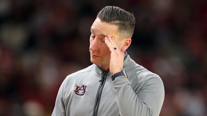 Feb 14, 2026; Fayetteville, Arkansas, USA; Auburn Tigers head coach Steven Pearl reacts to a play during the second half against the Arkansas Razorbacks at Bud Walton Arena. Mandatory Credit: Nelson Chenault-Imagn Images
