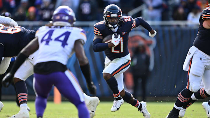 Oct 15, 2023; Chicago, Illinois, USA;  Chicago Bears running back D'Onta Foreman (21) looks for running room in the second half against the Minnesota Vikings at Soldier Field. Mandatory Credit: Jamie Sabau-Imagn Images