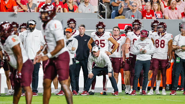 Sep 27, 2025; Raleigh, North Carolina, USA; Virginia Tech Hokies interim head coach Philip Montgomery shouts to his team during the first half of the game against North Carolina State Wolfpack at Carter-Finley Stadium. Mandatory Credit: Jaylynn Nash-Imagn Images
