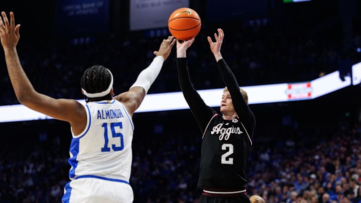 Jan 14, 2025; Lexington, Kentucky, USA; Texas A&M Aggies guard Hayden Hefner (2) shoots the ball against Kentucky Wildcats forward Ansley Almonor (15) during the first half at Rupp Arena at Central Bank Center. Mandatory Credit: Jordan Prather-Imagn Images Jan 14, 2025; Lexington, Kentucky, USA; Texas A&M Aggies guard Hayden Hefner (2) shoots the ball against Kentucky Wildcats forward Ansley Almonor (15) during the first half at Rupp Arena at Central Bank Center. Mandatory Credit: Jordan Prather-Imagn Images