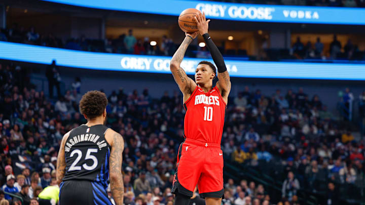 Dec 6, 2025; Dallas, Texas, USA; Houston Rockets forward Jabari Smith Jr. (10) shoots a jump shot over Dallas Mavericks forward P.J. Washington (25) during the first quarter at American Airlines Center. Mandatory Credit: Andrew Dieb-Imagn Images Dec 6, 2025; Dallas, Texas, USA; Houston Rockets forward Jabari Smith Jr. (10) shoots a jump shot over Dallas Mavericks forward P.J. Washington (25) during the first quarter at American Airlines Center. Mandatory Credit: Andrew Dieb-Imagn Images