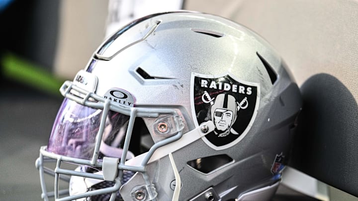 Aug 10, 2024; Minneapolis, Minnesota, USA; A Las Vegas Raiders helmet sits on the team bench before the game against the Minnesota Vikings at U.S. Bank Stadium. Mandatory Credit: Jeffrey Becker-Imagn Images