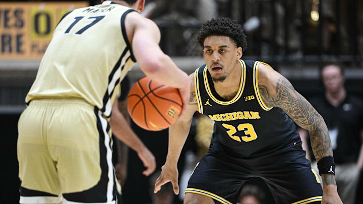 Feb 17, 2026; West Lafayette, Indiana, USA; Michigan Wolverines forward Yaxel Lendeborg (23) defends against Purdue Boilermakers guard Omer Mayer (17) during the first half at Mackey Arena. Mandatory Credit: Marc Lebryk-Imagn Images Feb 17, 2026; West Lafayette, Indiana, USA; Michigan Wolverines forward Yaxel Lendeborg (23) defends against Purdue Boilermakers guard Omer Mayer (17) during the first half at Mackey Arena. Mandatory Credit: Marc Lebryk-Imagn Images