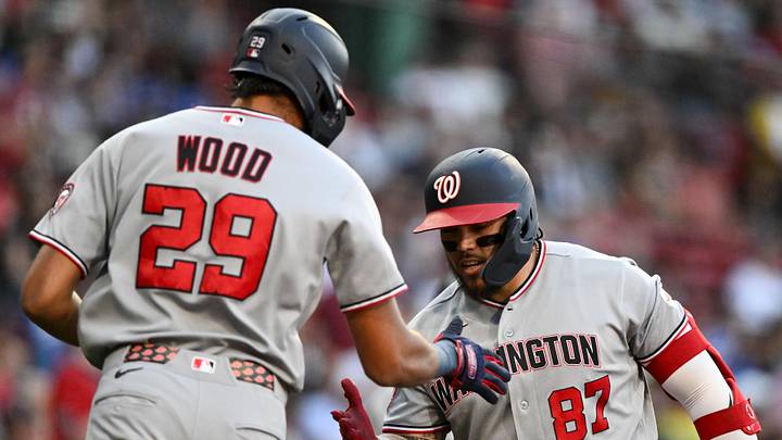 Jun 29, 2026; Boston, Massachusetts, USA; Washington Nationals shortstop CJ Abrams (5) high-fives first baseman Andrés Chaparro (87) after hitting a solo home run against the Boston Red Sox during the first inning at Fenway Park. Mandatory Credit: Brian Fluharty-Imagn Images