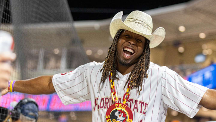 An FSU fan cheers on the Seminoles as they matched up against UF, March 10, 2026, at Condron Family Ballpark in Gainesville, Florida.The Gators won 6-3. [Cyndi Chambers/ Gainesville Sun] 2026