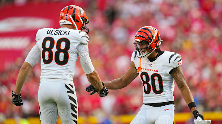 Sep 15, 2024; Kansas City, Missouri, USA; Cincinnati Bengals wide receiver Andrei Iosivas (80) celebrates with tight end Mike Gesicki (88) after an interception during the first half against the Kansas City Chiefs at GEHA Field at Arrowhead Stadium. Mandatory Credit: Jay Biggerstaff-Imagn Images Sep 15, 2024; Kansas City, Missouri, USA; Cincinnati Bengals wide receiver Andrei Iosivas (80) celebrates with tight end Mike Gesicki (88) after an interception during the first half against the Kansas City Chiefs at GEHA Field at Arrowhead Stadium. Mandatory Credit: Jay Biggerstaff-Imagn Images