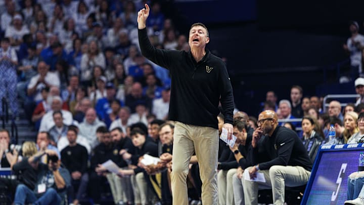 Feb 28, 2026; Lexington, Kentucky, USA; Vanderbilt Commodores head coach Mark Byington yells to his players from across the court during the first half against the Kentucky Wildcats at Rupp Arena at Central Bank Center. Mandatory Credit: Jordan Prather-Imagn Images